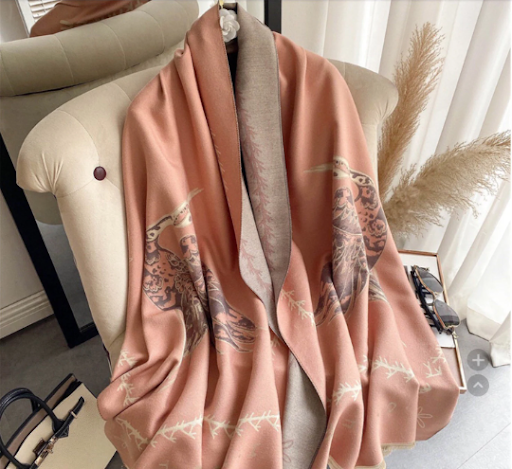 luxury pashmina luxury ,great gift , very soft light pink and beige just like the picture